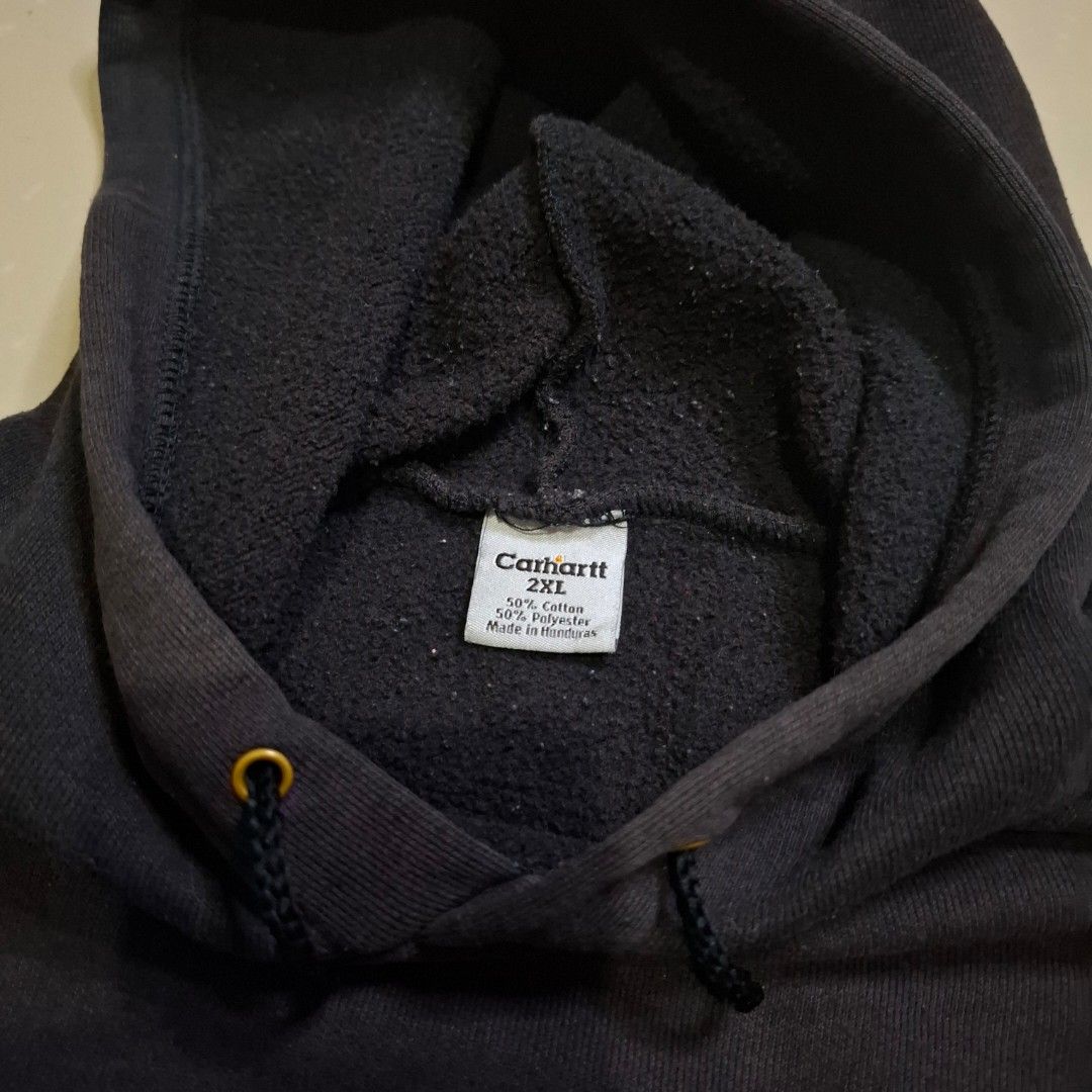 Carhartt 2XL black boxy pullover hoodie (Category: Coats, Jackets and Outerwear) located in Cainta. Submitted by soliven_ (Listing ID 1352534078, Image 3). Description: 2XL on tag Measurements (inches): Length 30 Width 30 condition: 8/10 — few unnoticeable pinholes. minor fade. scratch. oil stain (back part). ₱1.3k.