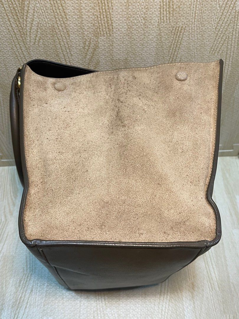 celine (Category: Luxury Bags & Wallets) located in Calamba. Submitted by thriftingoverload (Listing ID 1352636735, Image 3). Description: plus shipping fee missing strap may mga stain or discoloration sa suede leather may dikit din ng pintura sa likod.