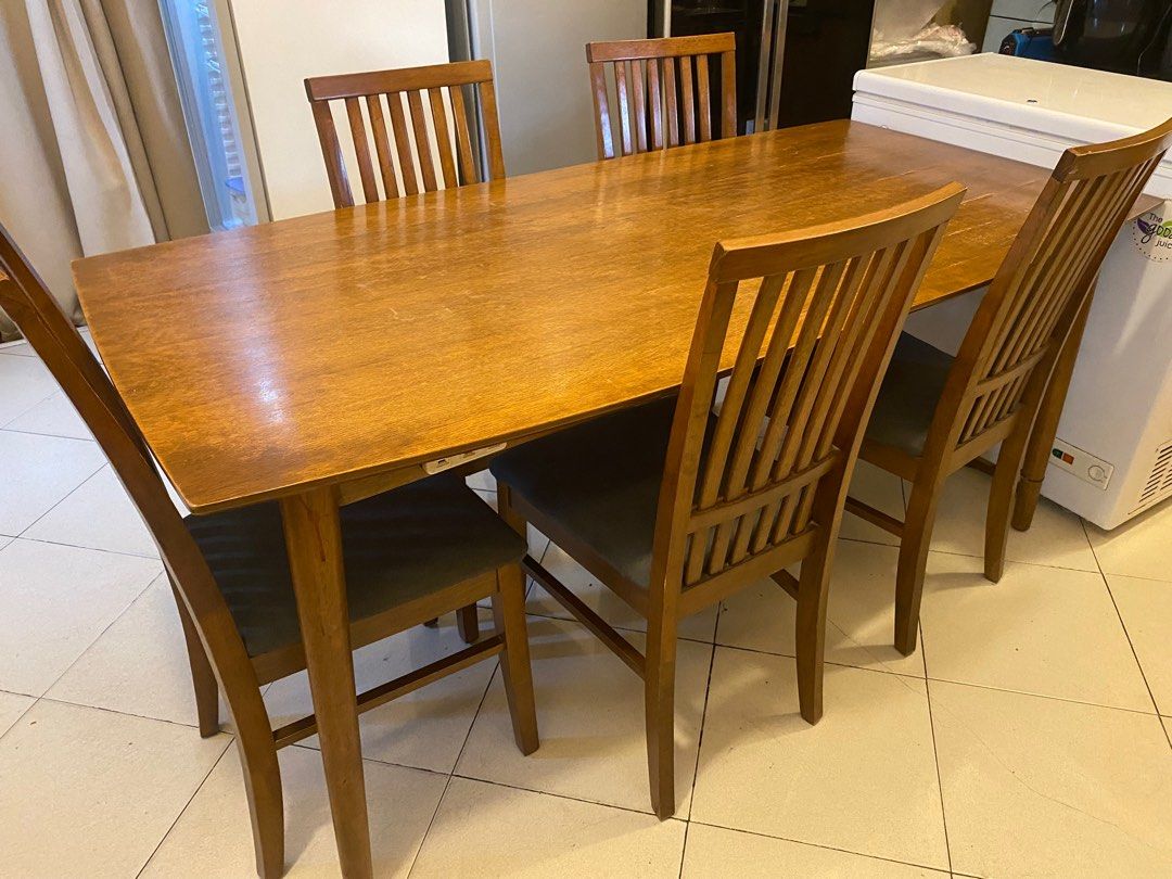 Dining table with 6 chairs (Category: Tables & Sets) located in Manila. Submitted by geesp (Listing ID 1352606141, Image 1). Description: Dining table for 6-8 persons. Dining table and. 6 chairs (1 chair is not just Included in the photo.) Bought at SM megamall at 25k.