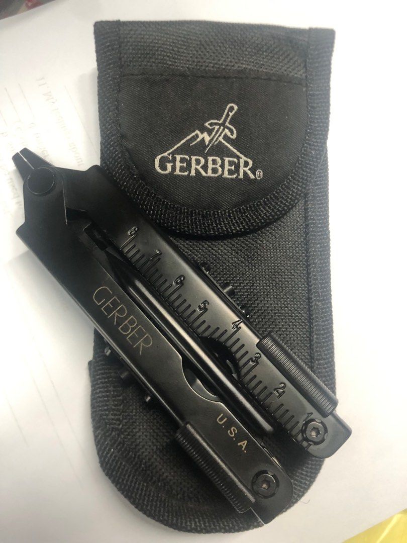 Gerber Multitool (Category: Construction Tools & Equipment) located in Pasig City. Submitted by wild_rex_blaza (Listing ID 1352530836, Image 1). Description: Gerber Multi tool Black heavy duty Legit.Preloved. Brand new. With sheath case 989 pesos Reason for selling: decluttering collection .