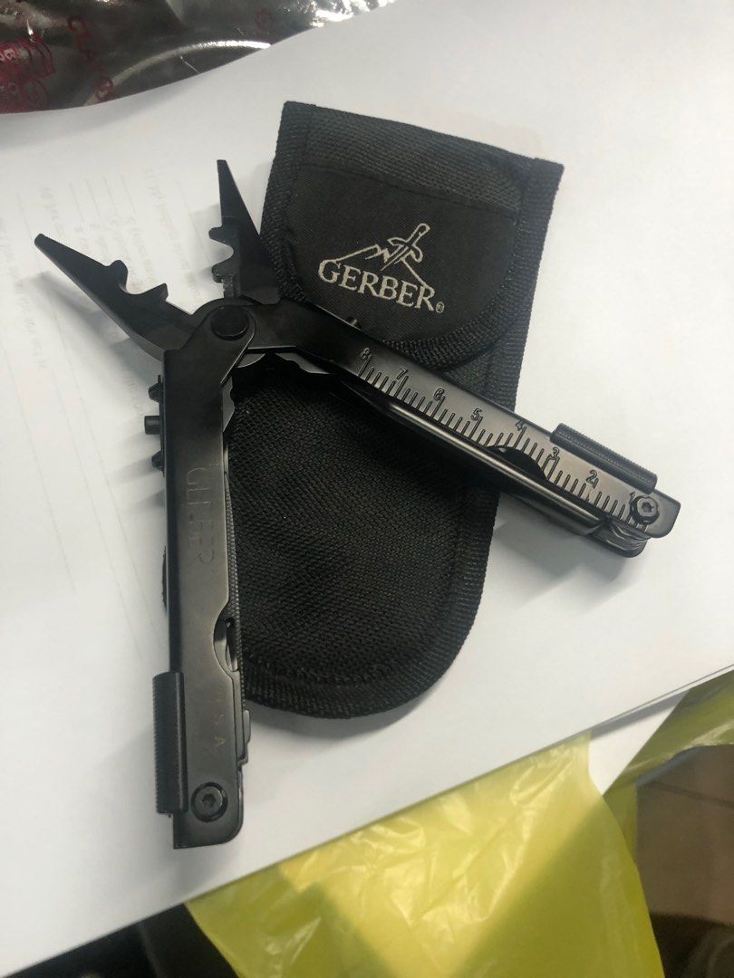 Gerber Multitool (Category: Construction Tools & Equipment) located in Pasig City. Submitted by wild_rex_blaza (Listing ID 1352530836, Image 2). Description: Gerber Multi tool Black heavy duty Legit.Preloved. Brand new. With sheath case 989 pesos Reason for selling: decluttering collection .