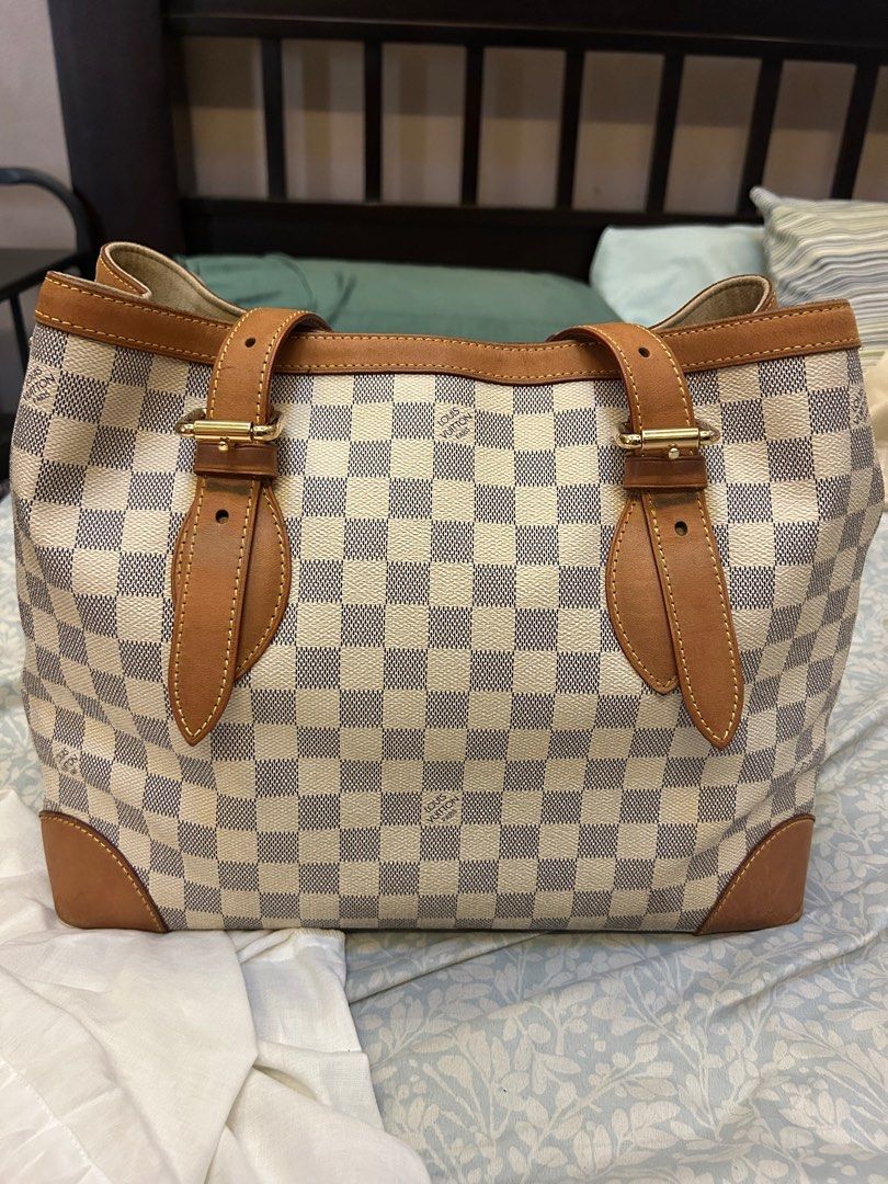 Louis Vuitton Damier Azur Hampstead GM (Category: Luxury Bags & Wallets) located in Bulacan. Submitted by 3Coolitz (Listing ID 1352662532, Image 3). Description: Super beautiful bag in actual! Gold hardware, minimal signs of use. There’s just pen mark on the pocket inside. And dark marks where the hardware touches the vanchetta on the strap. Hard to let go of this beautiful bag but need to declutter. Too many bags. With original LV dustbag.