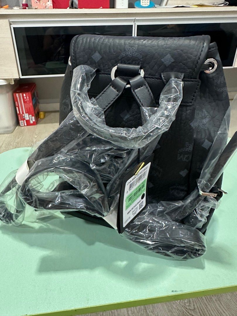 MCM Black Bag (Category: Bags & Wallets) located in Singapore. Submitted by ricquek467 (Listing ID 1352638235, Image 3). Description: Totally new bag. Original price is on the tag. Authentic product. .