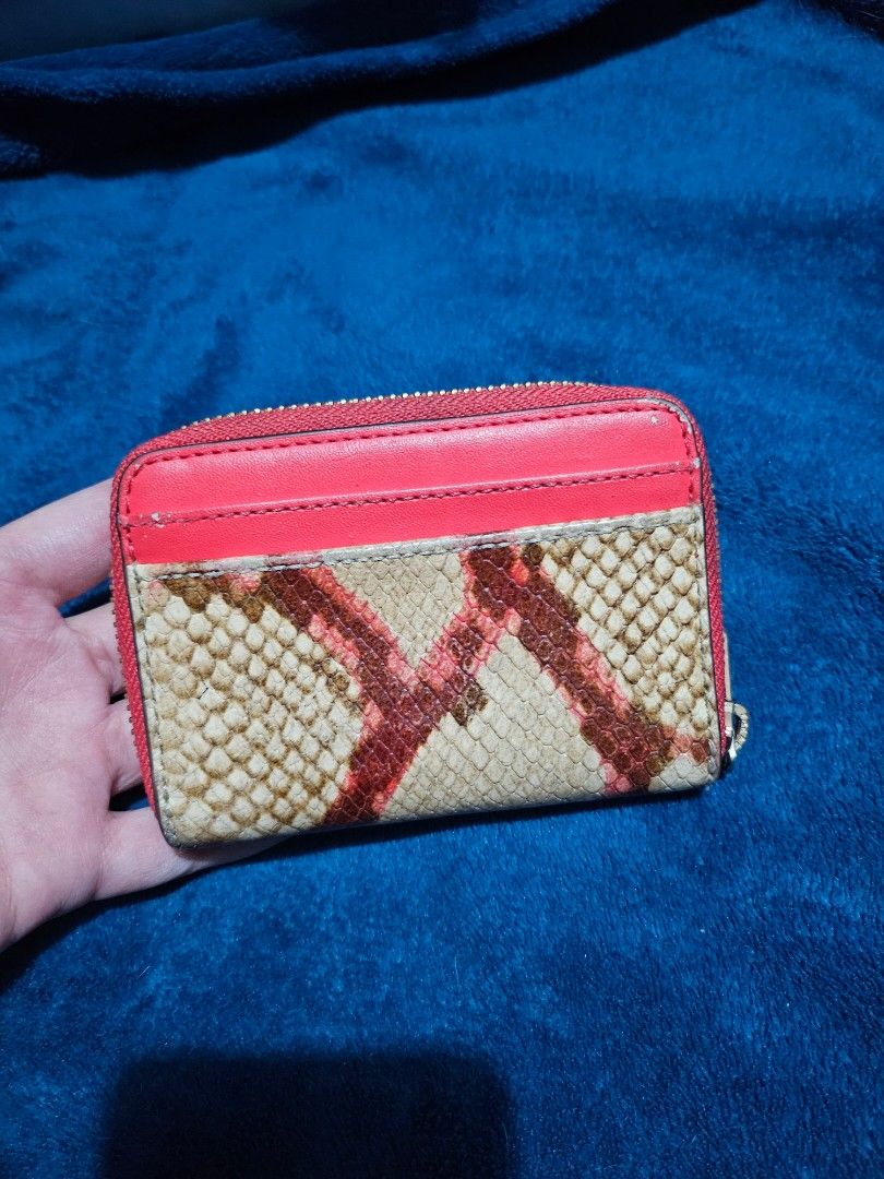 Michael Kors zipped red phyton wallet (Category: Wallets & Card holders) located in San Pedro. Submitted by allenaaa (Listing ID 1352675463, Image 2). Description: Mk zipped wallet Guaranteed authentic.