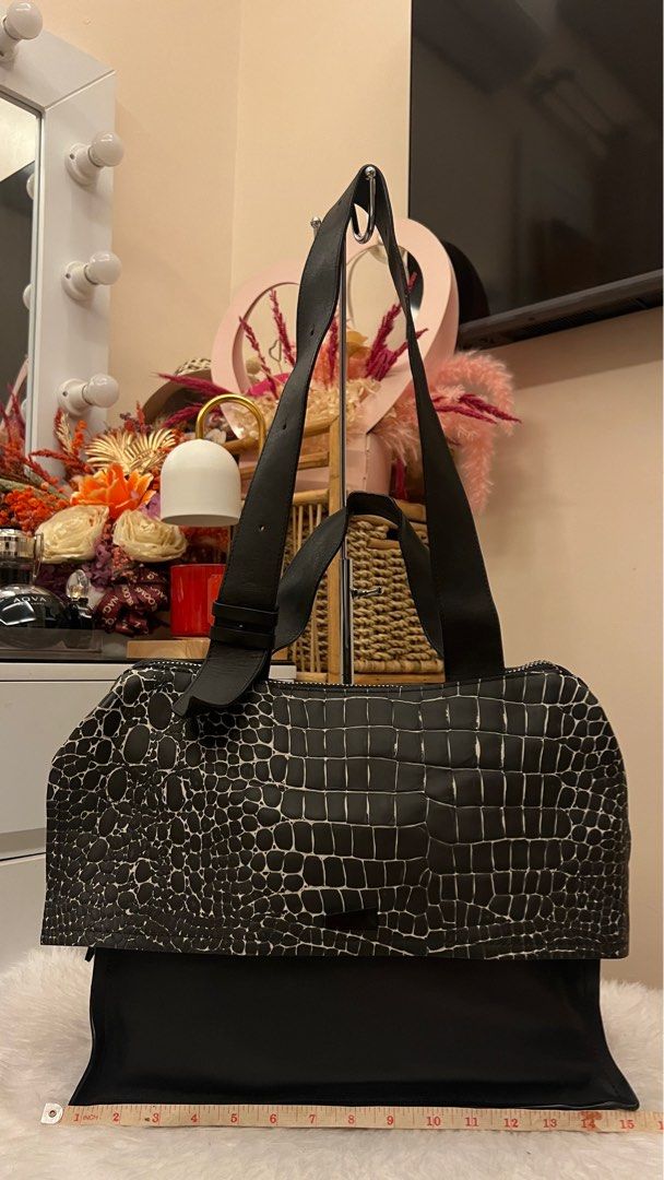 Rouge & Lounge two way (Category: Luxury Bags & Wallets) located in Naga. Submitted by thriftntr (Listing ID 1352637431, Image 3). Description: R⭕️uge & Lounge | 2,500 Korean luxury brand Large size | Can be two way but a bit difficult i think to use as handbag only? 😅 Color Black with alligator print accent Genuℹ️ne leather Silver hardwares Zipper closure 2 exterior compartments (Front & Back) Orig strap | Not detachable ; Adjustable Hologram i