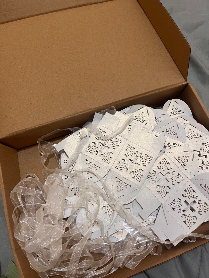 Small Souvenir Box for Christening (Category: Accessory Holder, Box & Organizers) located in Manila. Submitted by newbiessness (Listing ID 1352651169, Image 1). Description: Available 50 pcs souvenir boxes . It can hold small accessories for giveaways for christening..
