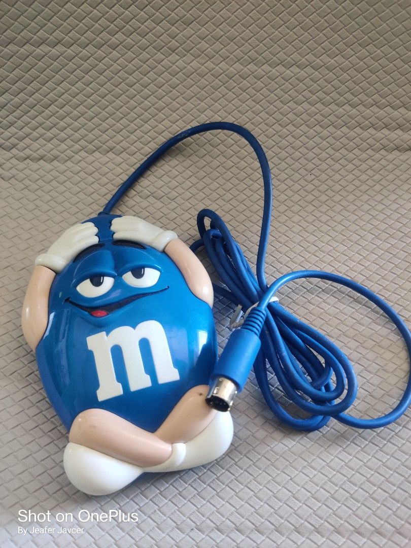vintage m&m pc mouse (Category: Mouse & Mousepads) located in Baguio. Submitted by ferns_garage.0924 (Listing ID 1352524198, Image 3). Description: vintage m&m pc mouse not tested (as it is) scan pics for reference and other details. wysiwyg. MOP GCASH The seller is not liable for any damages or loss of items due to mishandling of couriers..