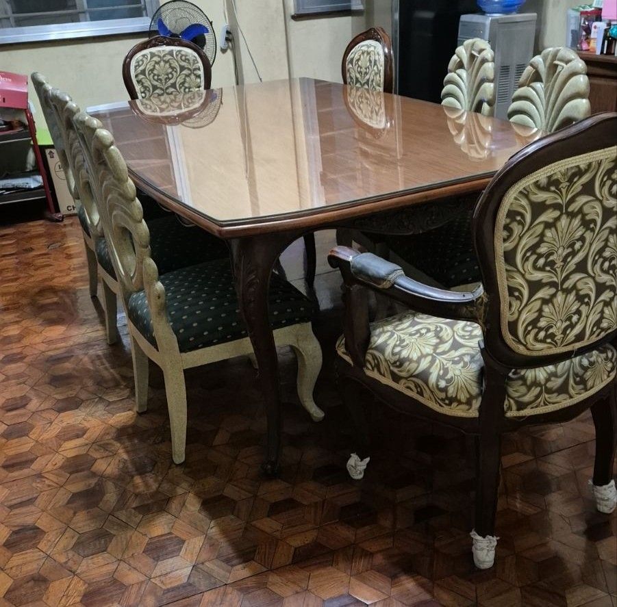 Antique furniture (Category: Tables & Sets) located in Caloocan City. Submitted by cleanup_clutter (Listing ID 1352867199, Image 2). Description: antique dining set 8 chairs and 8 seater dining table. the chairs are 2 different styles of carved mahogany and narra..