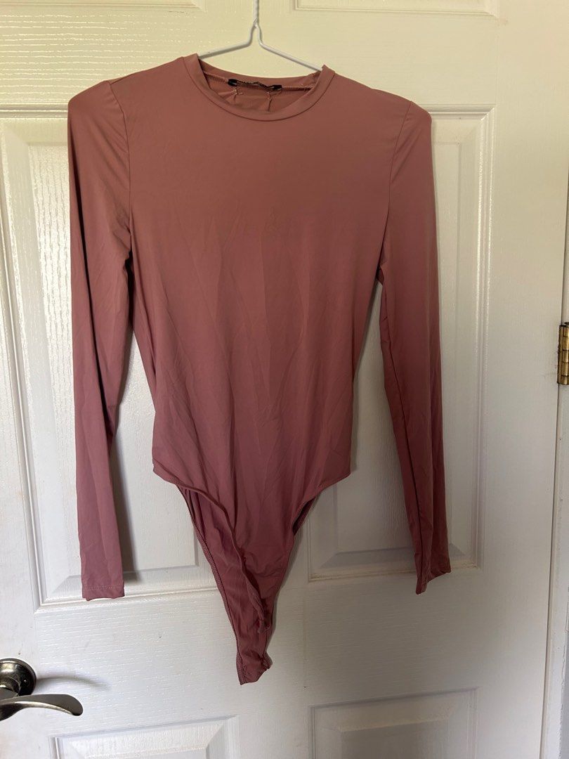 Bodysuit Rosegold Top (Category: Others Tops) located in Manila. Submitted by cutesypatsy (Listing ID 1352719890, Image 1). Description: .