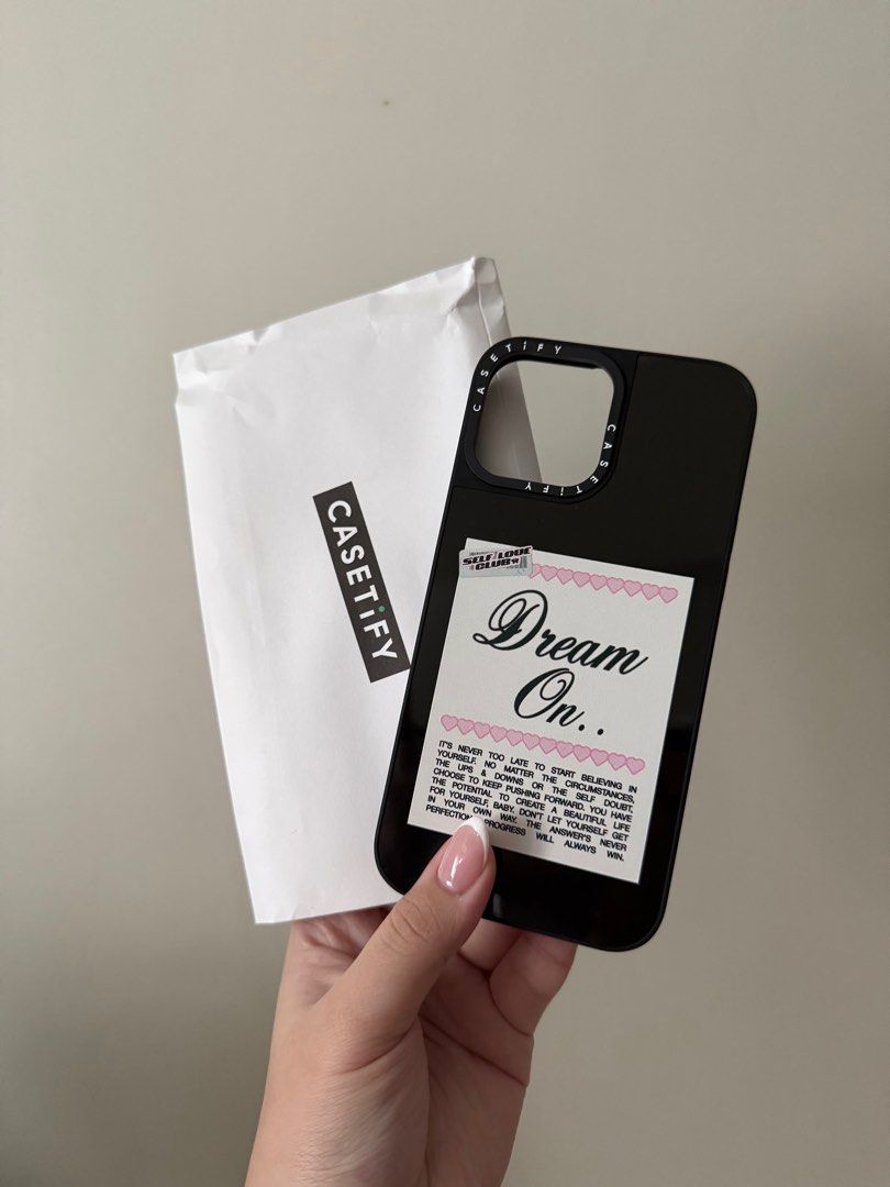 Casetify Mirror Case (Magsafe)- iPhone 13 Pro Max (Category: Cases & Sleeves) located in Manila. Submitted by jaehyunsbff (Listing ID 1352748225, Image 1). Description: Self-Love by Top Girl Studio x Casetify - 1800 LP - Magsafe - Just tried it on my phone but didn’t really like the color :( - Comes with the casetify box!.