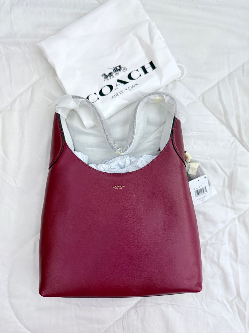 Coach Brooklyn Shoulder Bag 28 - Ruby Red (Category: Luxury Bags & Wallets) located in Manila. Submitted by lennortfinds (Listing ID 1352703835, Image 2). Description: Discounted price at 17500php (from 20500php) ✨WTS / LFB Coach Brooklyn Shoulder Bag 28✨ Color: Ruby Red Guaranteed original New / Never used and in pristine condition Note: Coach tag has been personalized with my initials in hotstamp which can be removed with cleaning agents. RFS: 