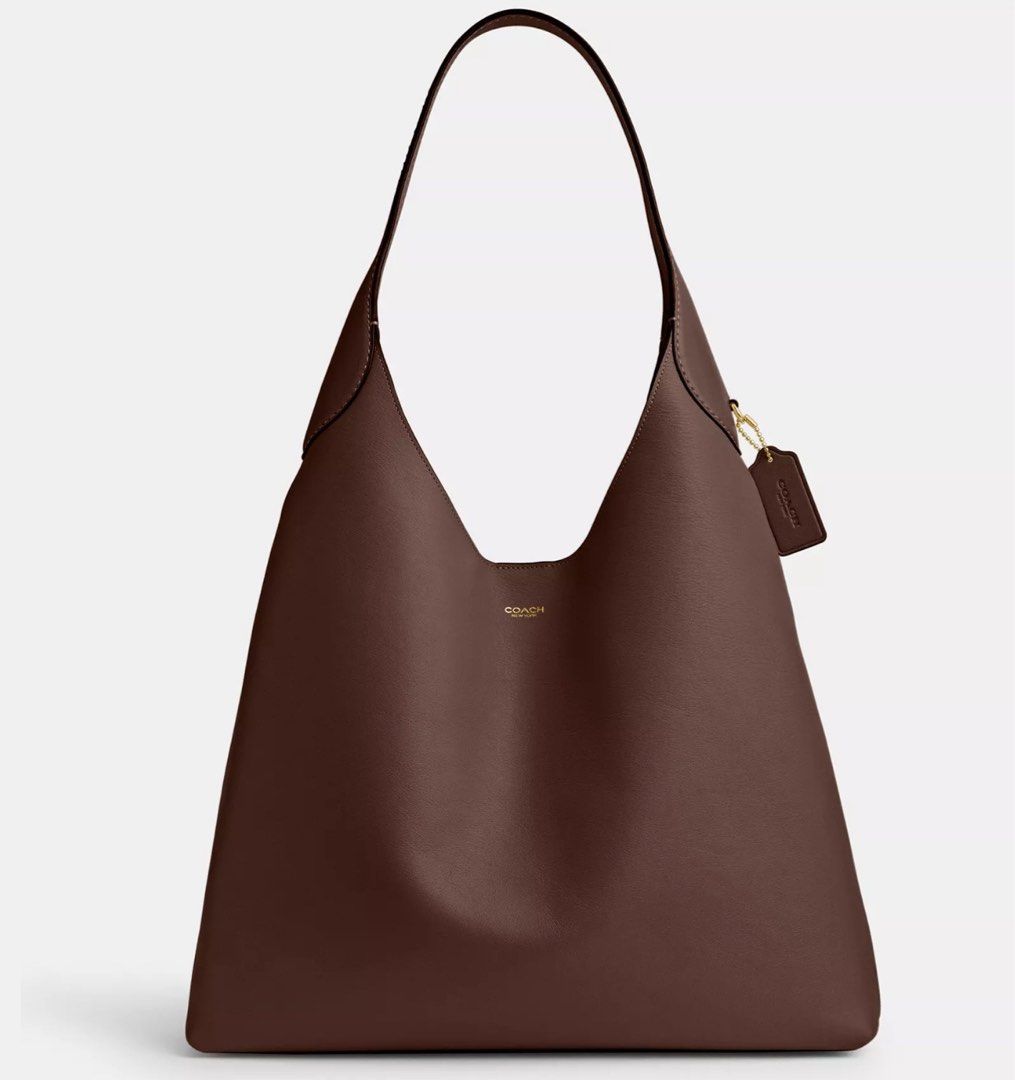 Coach Brooklyn Shoulder Bag 39 - Maple (Category: Luxury Bags & Wallets) located in Manila. Submitted by lennortfinds (Listing ID 1352704131, Image 1). Description: Discounted price at 27,500php (from 33000php) ✨WTS / LFB Coach Brooklyn Shoulder Bag 39✨ Color: Maple Guaranteed original New / Never used and in pristine condition Note: Coach tag has been personalized with hotstamp but can easily be removed with cleaning agents. RFS: Decluttering MO