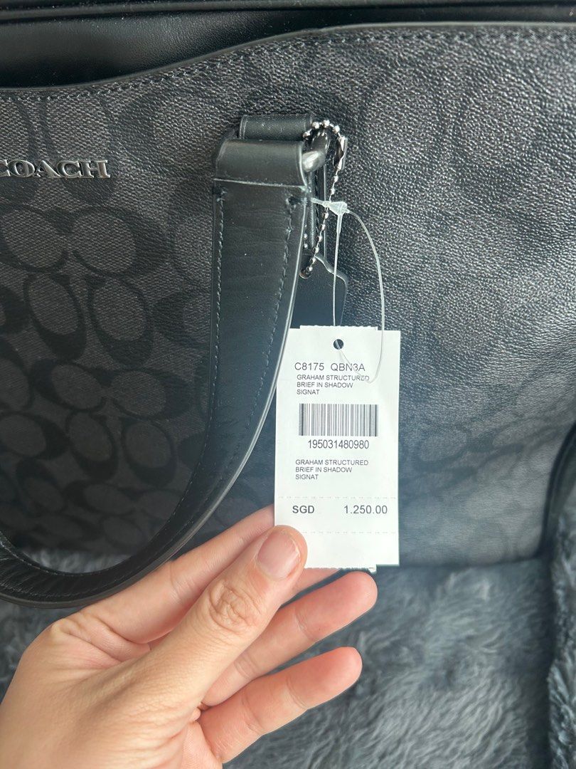 Coach Men Briefcase Bag (Category: Bags & Wallets) located in Singapore. Submitted by acathelizabeth (Listing ID 1352792410, Image 2). Description: BNWT - unused with tag Coach Graham Bag Men Briefcase Bag With strap, tag & dustbag Slight nego for fast deal Lowballers will be blocked .