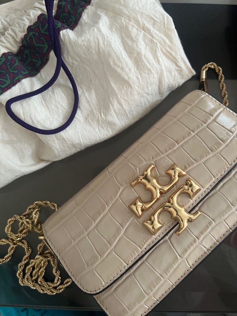 Tory Burch bag (Category: Purses & Pouches) located in Quezon City. Submitted by hometherapyph (Listing ID 1352731232, Image 2). Description: Barely used Tory bag with gold sling and dust bag .