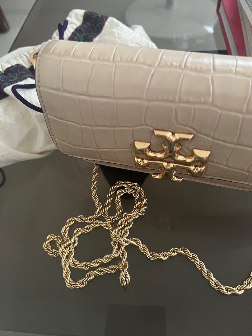 Tory Burch bag (Category: Purses & Pouches) located in Quezon City. Submitted by hometherapyph (Listing ID 1352731232, Image 3). Description: Barely used Tory bag with gold sling and dust bag .