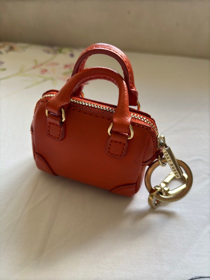 Tory Burch Orange Mini Bag Coin Purse (Category: Luxury Bags & Wallets) located in Manila. Submitted by katrine_gervacio (Listing ID 1352783413, Image 2). Description: .