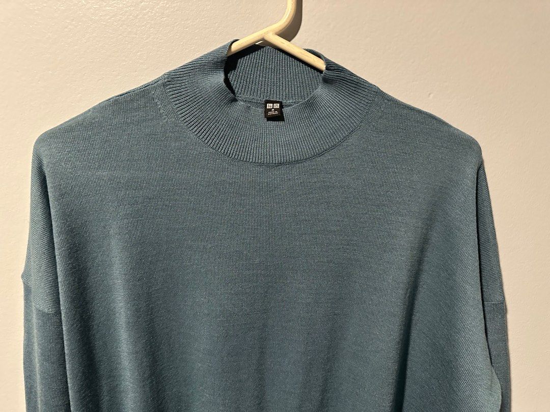 Uniqlo long top (Category: Longsleeves) located in Cainta. Submitted by annebc (Listing ID 1352814157, Image 3). Description: Color: Blue Gray Size: Medium Length: 31”.