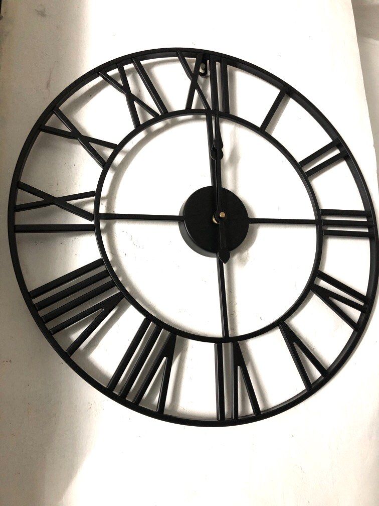50cm black metal decorative and functional wall clock (Category: Wall Decor) located in Caloocan City. Submitted by relique_boutique2026 (Listing ID 1353022695, Image 1). Description: .