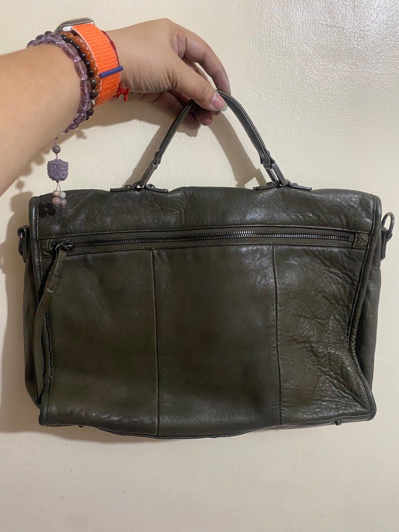 JULY ONLY SALE!!! Authentic JILL STUART Studded Satchel (Category: Luxury Bags & Wallets) located in Cavite. Submitted by lady_speculator_ph (Listing ID 1353020791, Image 2). Description: ✅ Authentic Jill Stuart bag up for grabs for only ₱1100! ✨Color: Army green ✨ Inclusion: Bag and original strap Note: Pls manage expectations - this bag is a prelove 😊 ✨ GET ANOTHER ITEM, THERE WILL BE ₱500 DISCOUNT! ✨ ✨ BUY THIS AND CHOOSE 1 ITEM ON MY “FREE” 