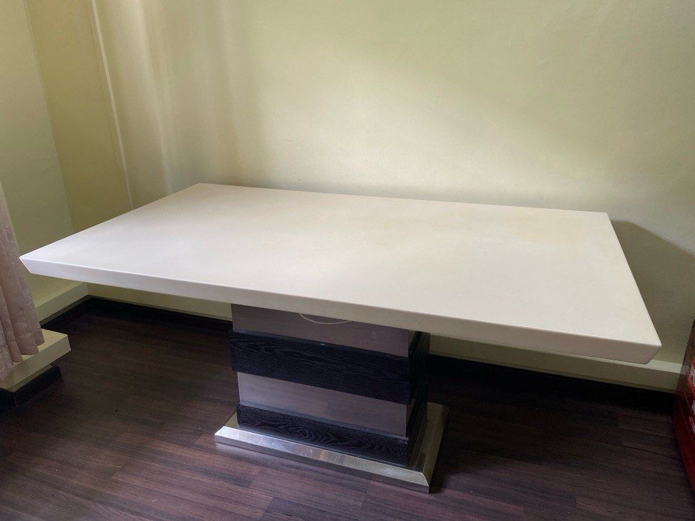 Dining Table (Category: Tables & Sets) located in Singapore. Submitted by saroja2024 (Listing ID 1352916943, Image 1). Description: 1.6mtr x 0.895 mtr Beautifull dining table with marble top and center peice. small shining dots on the top. no dismantling required (remove the marble top from center piece without any tools) Self collection at Jurong West St 64.