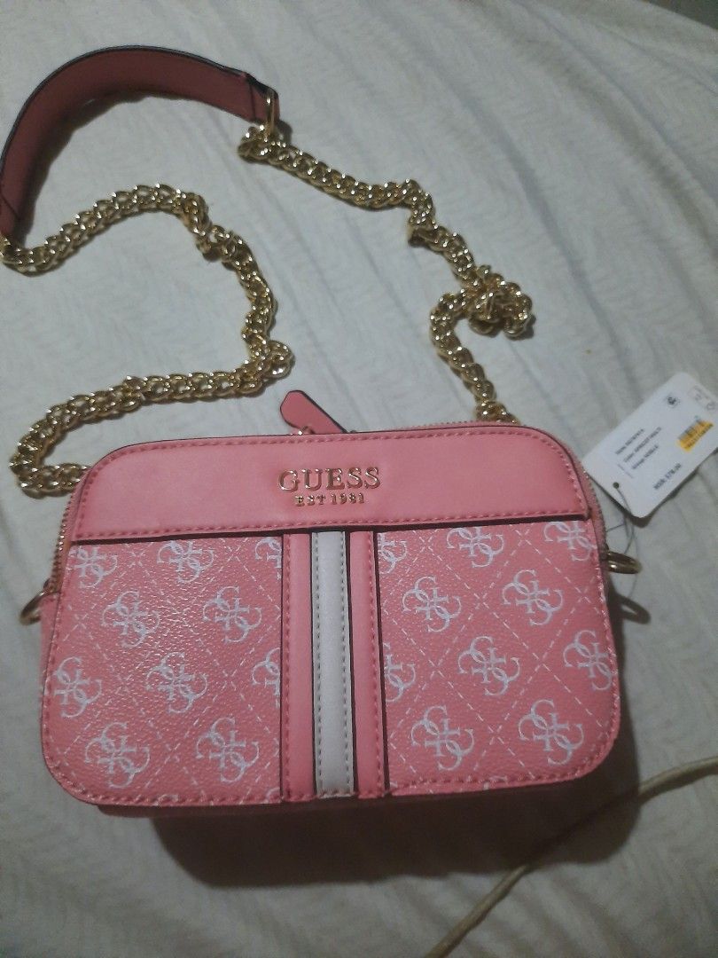 Guess Noelle Crossbody Bag (Category: Cross-body Bags) located in Quezon City. Submitted by favbessentiales (Listing ID 1352897988, Image 3). Description: original price Php 3800 refer to the last photo for the minimal flaws, due to being unused and storage. No dust bag. Thank you..