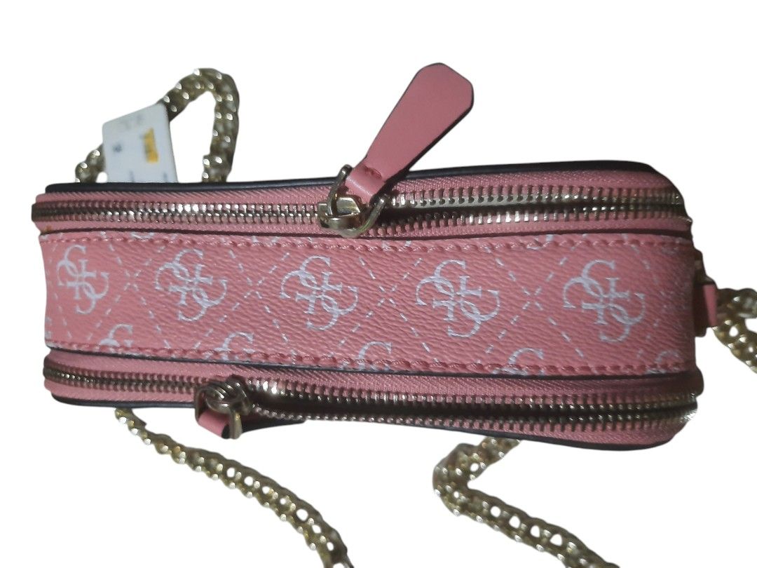 Guess Noelle Crossbody Bag (Category: Cross-body Bags) located in Quezon City. Submitted by favbessentiales (Listing ID 1352897988, Image 2). Description: original price Php 3800 refer to the last photo for the minimal flaws, due to being unused and storage. No dust bag. Thank you..