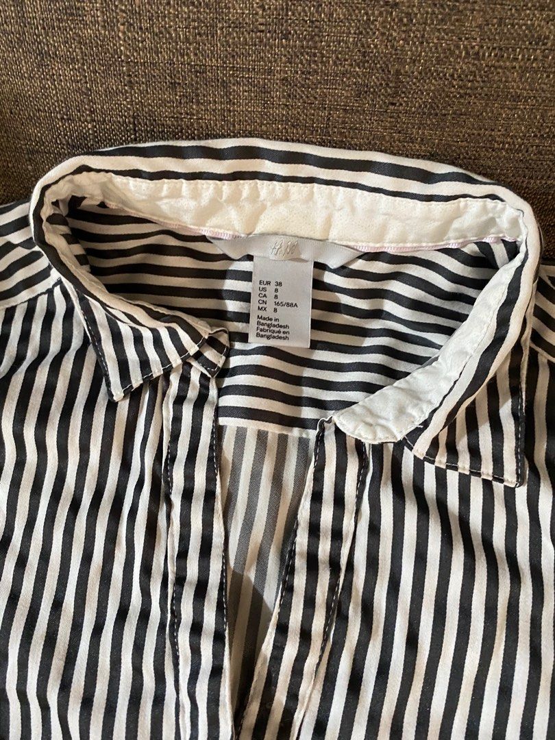 H&M office wear stripes (Category: Blouses) located in Quezon City. Submitted by chimisells (Listing ID 1352960857, Image 2). Description: H&M stripes office wear Refer to photo for size.