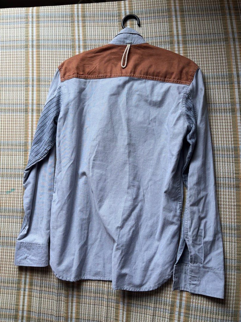 Junya Watanabe Western Style denim shirt (Category: Tshirts & Polo Shirts ) located in Calamba. Submitted by miggo___ (Listing ID 1352874280, Image 3). Description: Junya Watanabe western style denim shirt Great for a nice cowboy look Measurements L - 26 inches Pit to Pit - 18 inches Sleeves - 24 inches No major issues, tags are quite faded some signs of wear but still in great condition Price is negotiable, shipping will be shouldered by buyer .