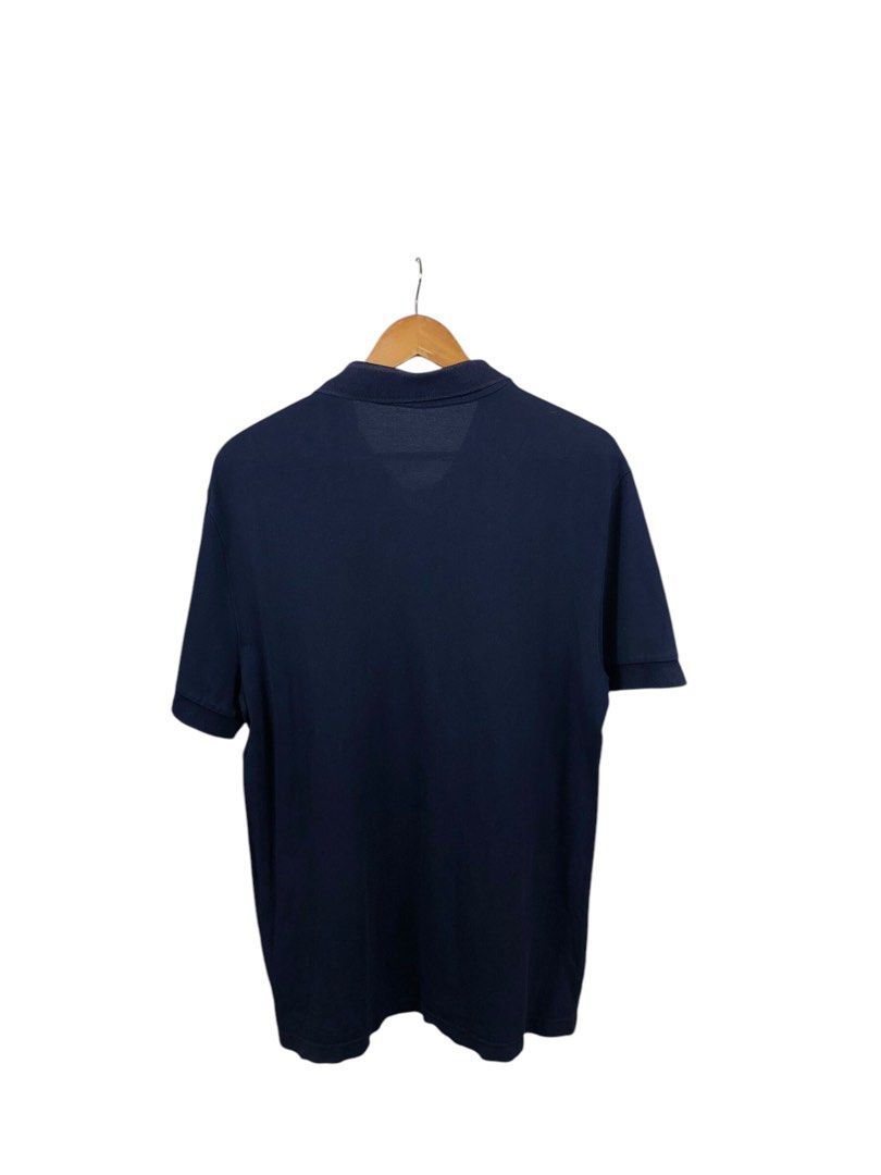 Lacoste Navy Blue Polo Shirt (Category: Tshirts & Polo Shirts ) located in Manila. Submitted by 12essentials (Listing ID 1352892806, Image 3). Description: 📌 Excellent Condition 📌 XL on tag 📌 Length 29’ Width 21’.