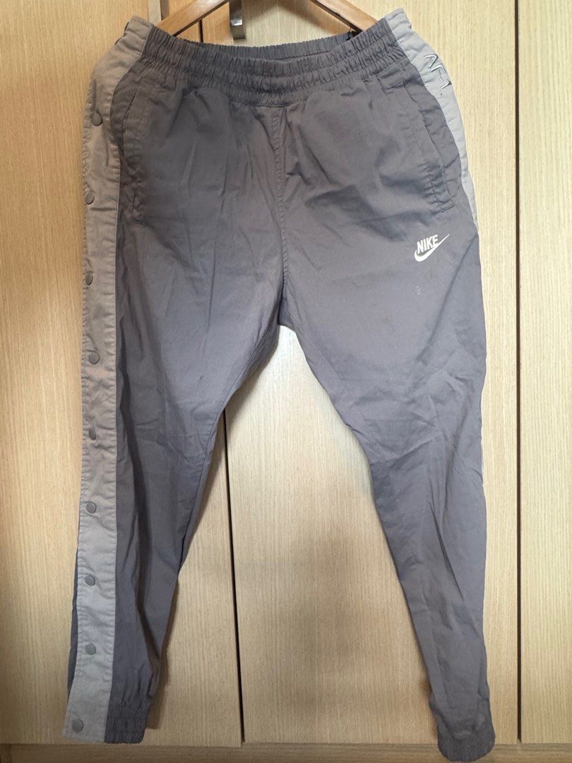 Nike AF-1 Tearaway Jogger Pants (Category: Joggers) located in Taguig. Submitted by jcs86 (Listing ID 1352948480, Image 1). Description: Nike AF-1 Tearaway Jogger Pants Size: Large Issue: Barely noticeable pen stain on butt area. See photo. Drawstring waist and cuffed ankles ** Buyer books and shoulders shipping. **.