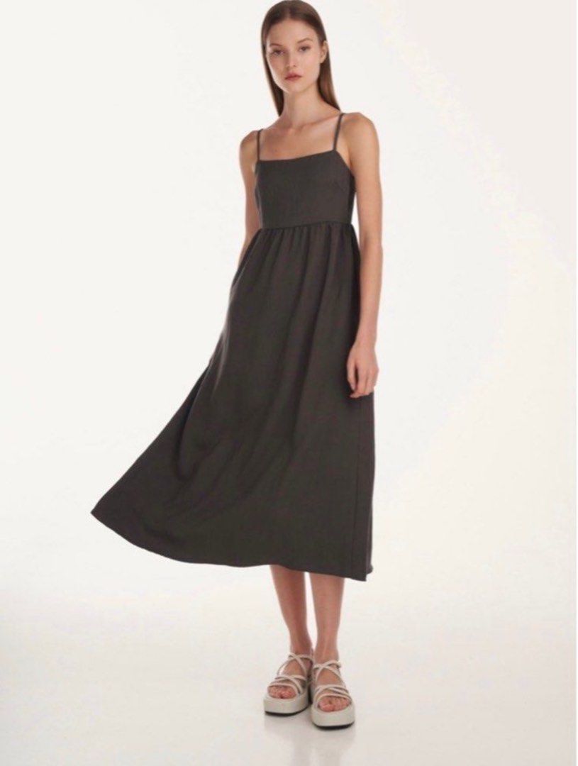 Treza Tencel Babydoll Dress (Category: Dresses) located in Singapore. Submitted by yantaukia (Listing ID 1352928176, Image 1). Description: Treza Tencel Babydoll Dress Charcoal Tagged size M Adjustable straps, back is slightly elasticized Approximate measurements, measured flat, unstretched: -ptp: 17-17.5” - length down: 39” (back, middle), 42” (front, middle) both excluding straps slight discoloration in the front, refer to pics for the details 
