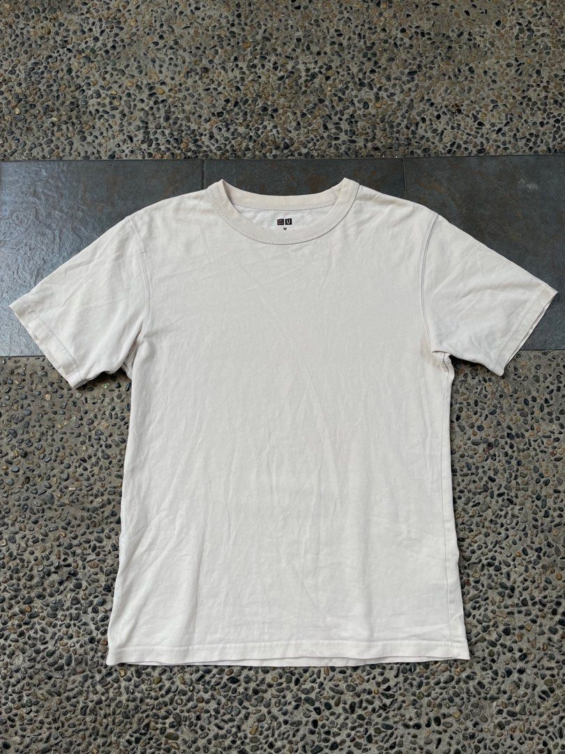 Uniqlo Cream Shirt (Category: Tshirts & Polo Shirts ) located in Cainta. Submitted by FirstBuys (Listing ID 1352944819, Image 1). Description: 21 x 27.