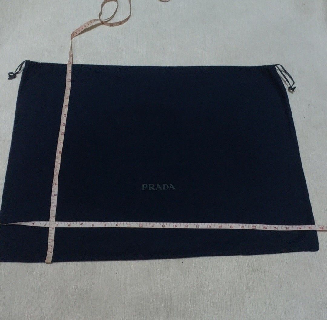 Authentic Prada dust bag 20x27.5 inches (Category: Luxury Bags & Wallets) located in Manila. Submitted by jfluxury.co (Listing ID 1353072216, Image 3). Description: excellent condition no flaws bought in Japan 🇯🇵 💯% Authentic. 😊 Money back guarantee. 😊 Clean and ready to use na.