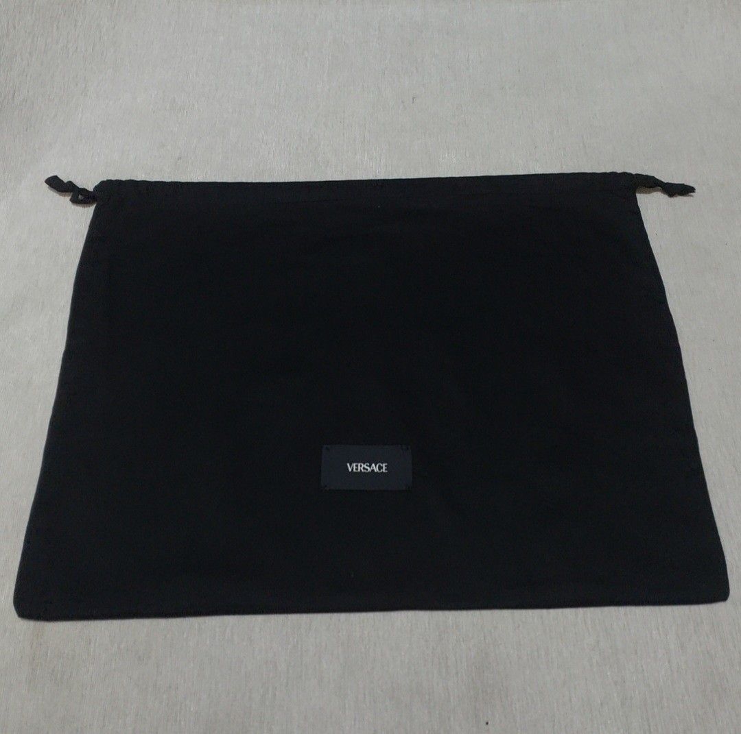Authentic Versace Dust bag 18x23 inches (Category: Luxury Bags & Wallets) located in Manila. Submitted by jfluxury.co (Listing ID 1353071440, Image 2). Description: excellent condition no flaws bought in Japan 🇯🇵 💯% Authentic. 😊 Money back guarantee. 😊 Clean and ready to use na.