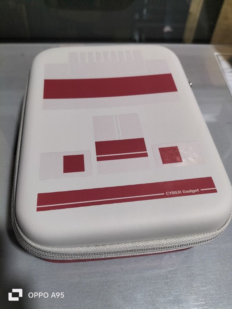 Cyber Classic Mini Famicom console storage case (Category: Nintendo) located in Caloocan City. Submitted by jshazz (Listing ID 1353054990, Image 3). Description: good as new. open box.
