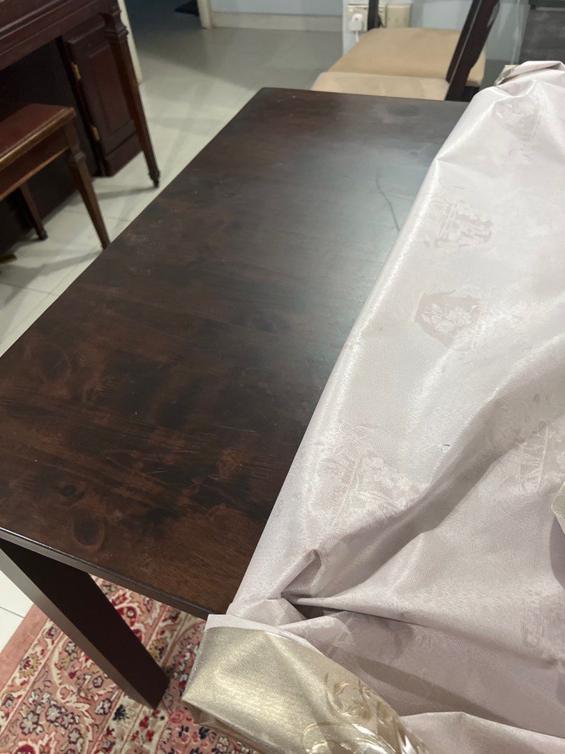 Dining Table (Category: Tables & Sets) located in Singapore. Submitted by giftedbrah (Listing ID 1353094217, Image 3). Description: Dark Wood Dining table. Good condition. Negotiable Can arrange for delivery. Or you can arrange yourself. .