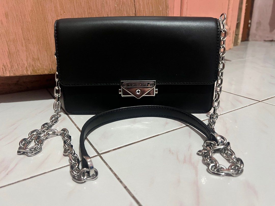Michael Kors Cece Medium Clutch Bag - Black and Silver Hardware (Category: Luxury Bags & Wallets) located in Bacolod City. Submitted by g0rejuice (Listing ID 1353074430, Image 1). Description: .
