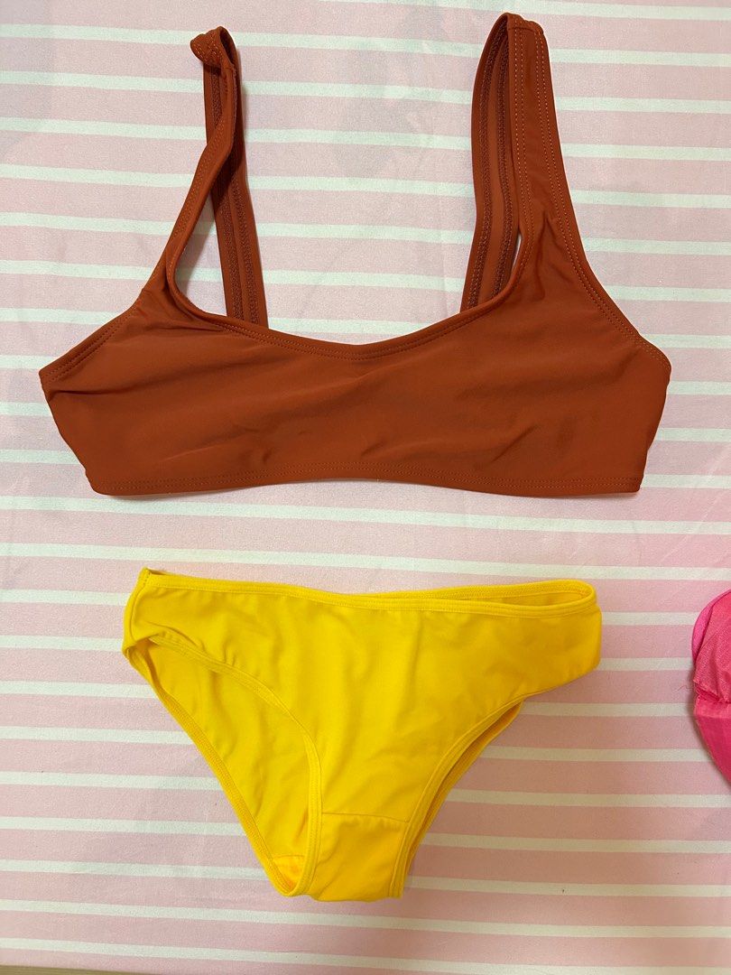 One piece swimsuit (Category: Bikinis & Swimsuits) located in Bulacan. Submitted by clncon (Listing ID 1353112961, Image 2). Description: Can fit small to medium frame Yellow set 150 Brown top 80 Yellow bottom 70.