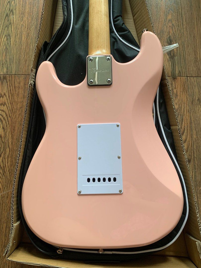 Thomson Stratocaster Electric guitar peach pink (Category: Musical Instruments) located in Apalit. Submitted by angelic.archives (Listing ID 1353101020, Image 3). Description: PICK THIS UP AT ISKALA MUSIC STORE, APALIT, PAMPANGA 🎸THOMSON ST-1 stratocaster 🎸BRANDNEW ELECTRIC GUITAR Fret: 22 Body: Solid Ash Wood Neck: Rosewood / Maple wood Fingerboard: Rosewood Pickup: S-S-S Controls:1V+2T Scale Length: 25-1/2" (648) Machine Head: Diecast 🎸 Free