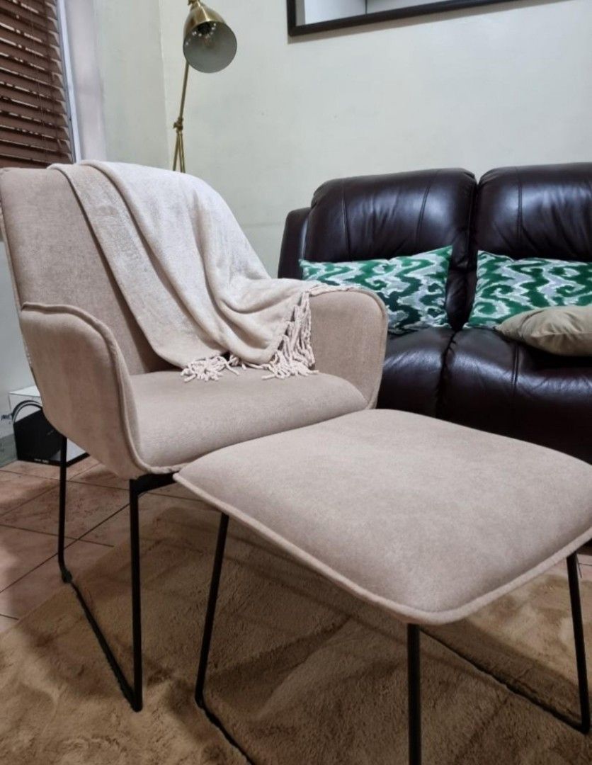 Accent chair with foot rest (Category: Chairs) located in Las Pinas. Submitted by luxeprelovedstuff (Listing ID 1353236510, Image 2). Description: accent chair w/ foot rest beige color- neutral like new selling low for pick up only (las piñas) pm for inquiries.