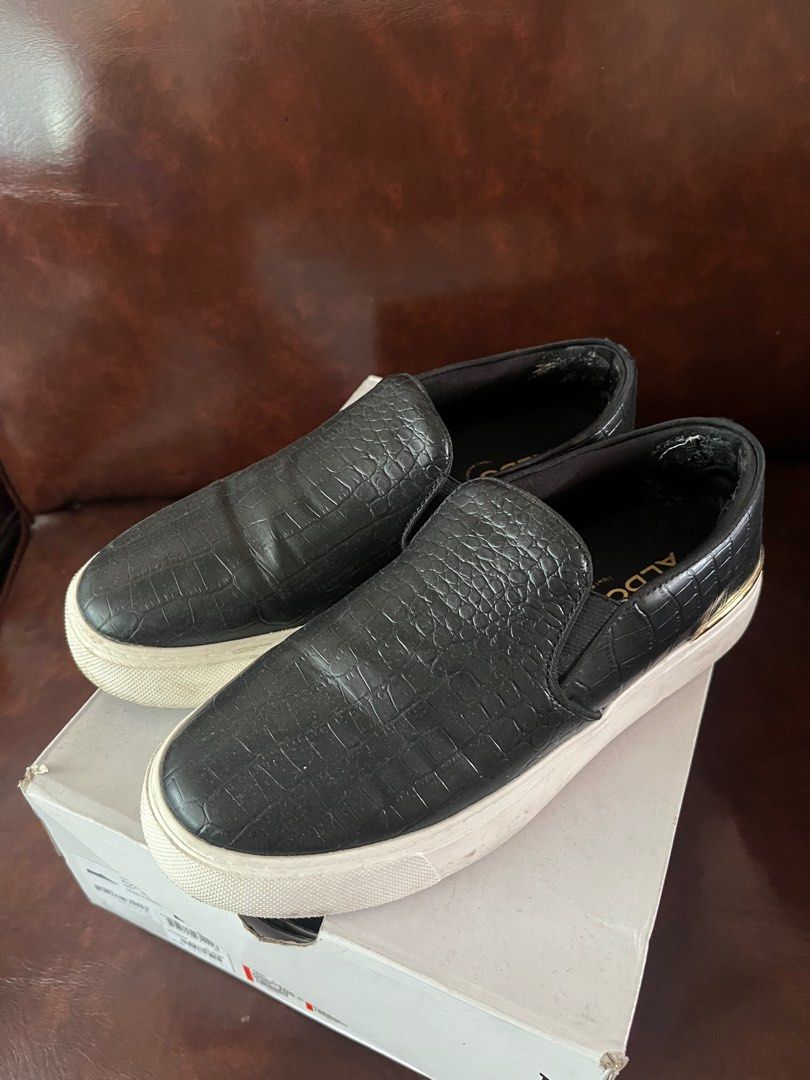 Aldo Slip-on Shoes (Category: Sneakers) located in Quezon City. Submitted by assdeclutters (Listing ID 1353224356, Image 1). Description: Please see last photo for the flaw. Just glue residue as I used anti-slip cause size is a bit big for me. Size 7.5. What you see is what you get. Rfs: impulsive buy & size runs big.