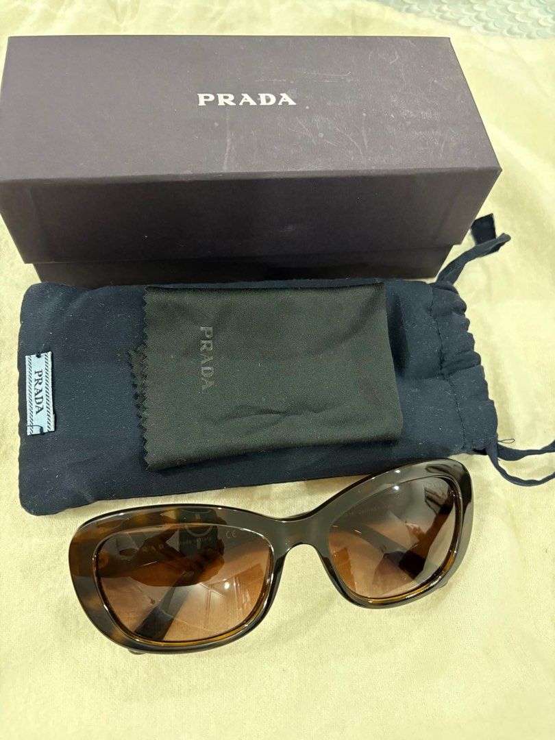 Authentic Preloved Almost Brandnew PRADA Eyeglass/ Shades (Category: Sunglasses & Eyewear) located in Del Monte. Submitted by GoodFindsbyM (Listing ID 1353369158, Image 1). Description: Almost new, not hardly used. SF to be shouldered by buyer..