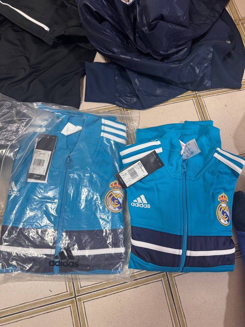 Brand New Real Madrid Jacket with Tag (Category: Activewear) located in Singapore. Submitted by johhhh (Listing ID 1353323197, Image 1). Description: 2 piece avail, with tag. Brand new and authentic at $40 each 🤓.