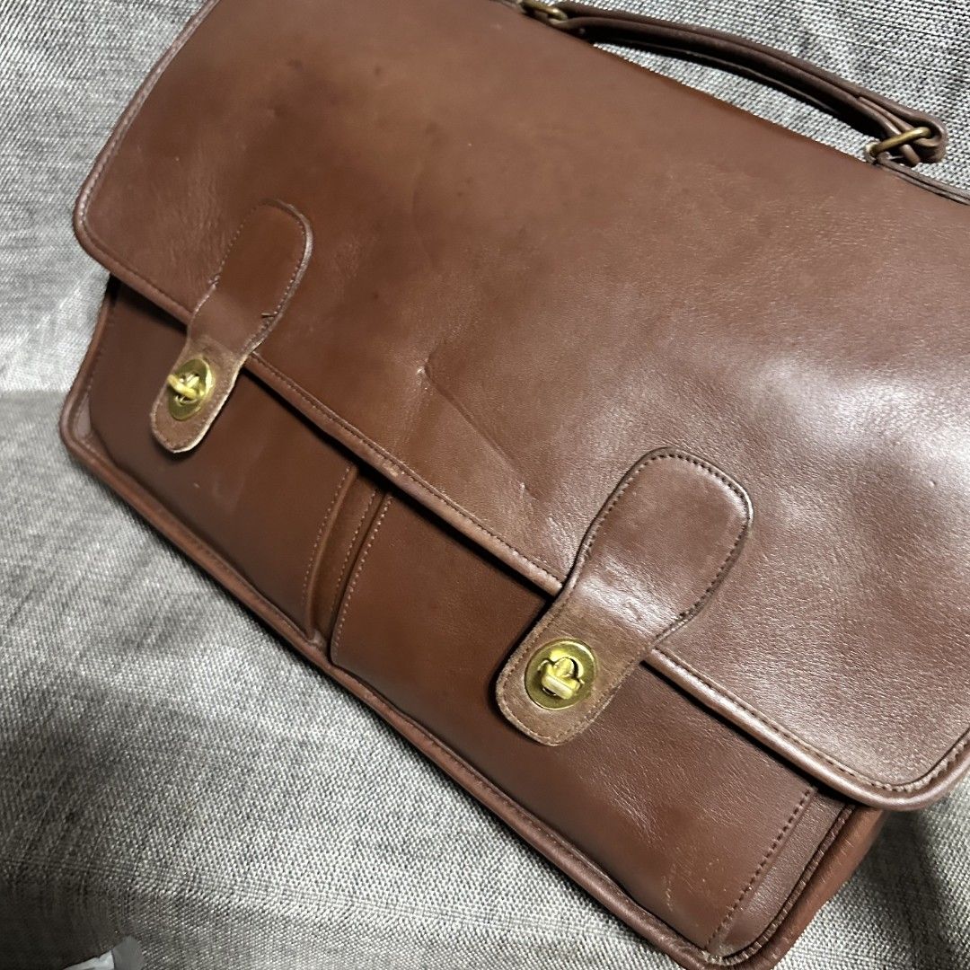 Coach document bag (Category: Luxury Bags & Wallets) located in Manila. Submitted by greyinfash06839 (Listing ID 1353345380, Image 2). Description: 🤍Price: 9,800 pesos only 🤍Item: Coach document bag 🤍Brand: Coach 🤍Matirial:Leather 🤍Quality: Original 🤍color: Brown 🤍Size: Large 🤍Dimension. H: 11 L: 16 W: 4 🤍Sex: For Men 🤍Issue: no strap 🤍Condition Rate: 9/10 🤍Other info:.