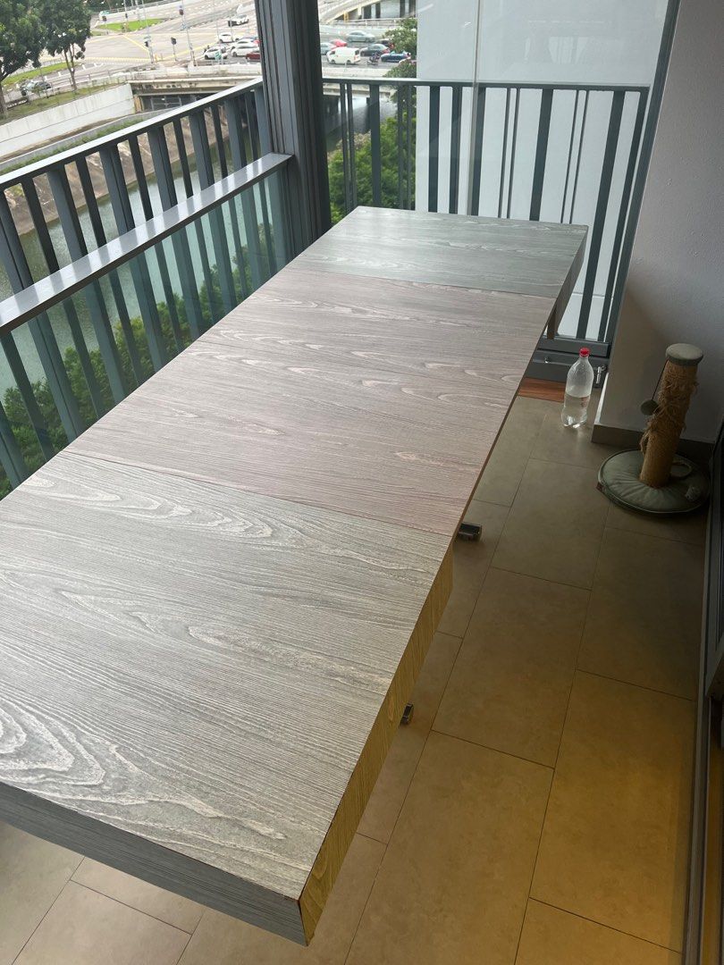 Dining Table (Category: Tables & Sets) located in Singapore. Submitted by home.decor (Listing ID 1353243031, Image 3). Description: Selling off our dining table as we are getting a new one. Good condition. Table able to open to make it bigger if needed for events or big gathering. Table able to sit 4 pax but when opened can fit up to 8 pax. Comes with 4 dining chairs as well. Heavy and good quality table. .