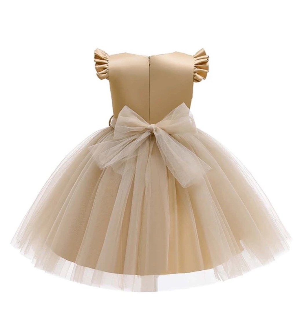 Elegant Dress (Category: Babies & Kids Fashion) located in Mandaluyong City. Submitted by ekaadoll (Listing ID 1353231206, Image 2). Description: Used once Apricot / Gold color Measurement Shoulder:25 cm, Length:70 cm, Bust:68 cm, Waist Size:64 cm fits to 6-7yo.