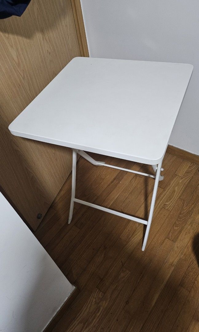 Foldable Table (Category: Tables & Sets) located in Singapore. Submitted by tottochan1983 (Listing ID 1353362162, Image 1). Description: 54cm x 54cm size. Steel table with white powder coating. It is very sturdy and easy to maintain and clean. Suitable for small places. Hardly used, like new. Self-collection only. Once confirmed, I will pm address to collect. I am in the northeast location.