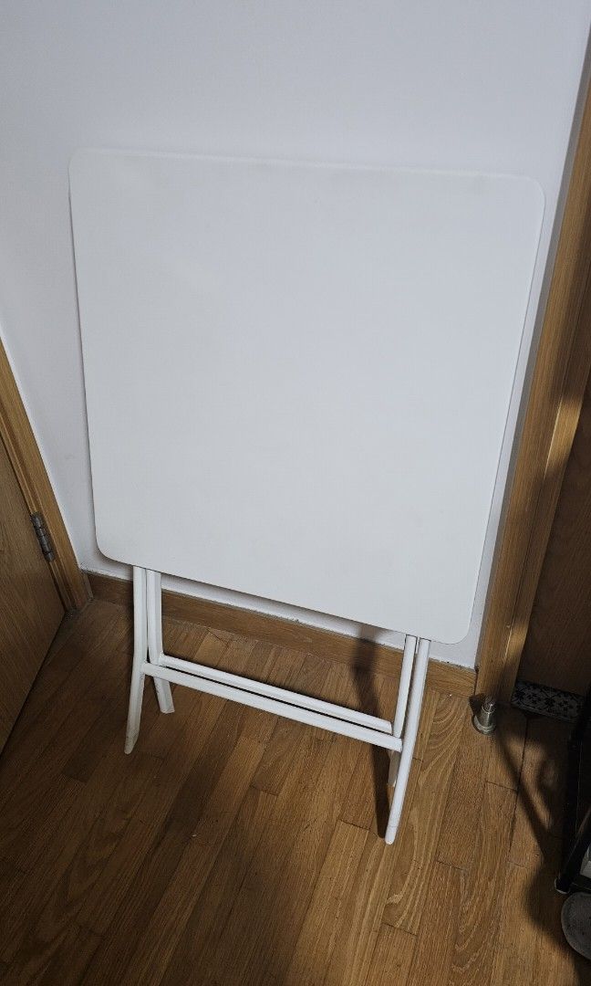 Foldable Table (Category: Tables & Sets) located in Singapore. Submitted by tottochan1983 (Listing ID 1353362162, Image 2). Description: 54cm x 54cm size. Steel table with white powder coating. It is very sturdy and easy to maintain and clean. Suitable for small places. Hardly used, like new. Self-collection only. Once confirmed, I will pm address to collect. I am in the northeast location.
