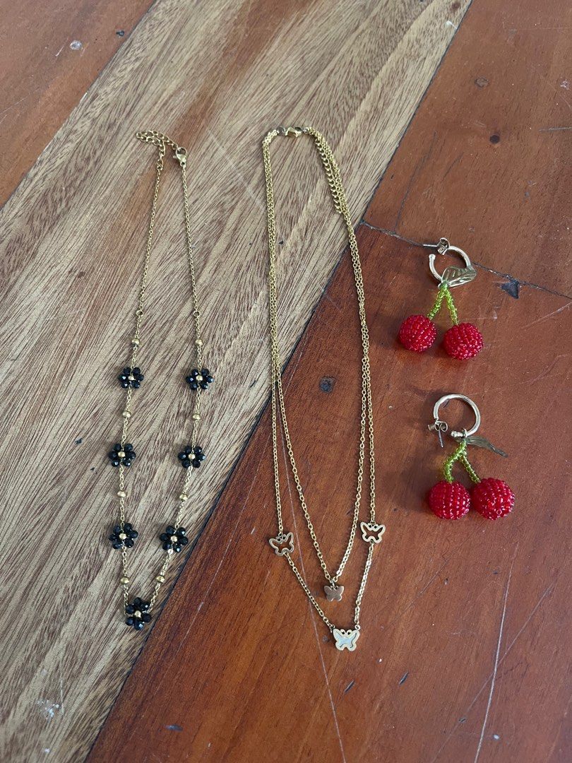 Gold Jewelry Bundle: 2 Necklace + cherry earrings (Category: Necklaces) located in Pasig City. Submitted by pre.lovedchia (Listing ID 1353243592, Image 1). Description: Negotiable .