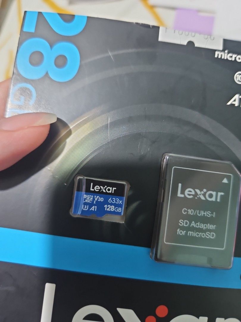 Lexar 128 GB micro SD card (Category: Memory & SD Cards) located in Manila. Submitted by elliaaa_ (Listing ID 1353367043, Image 3). Description: Brand new 128 GB micro SD with Adapter opened only, never used Original Price: Php 1,000 RFS: phone has no SD card slot.